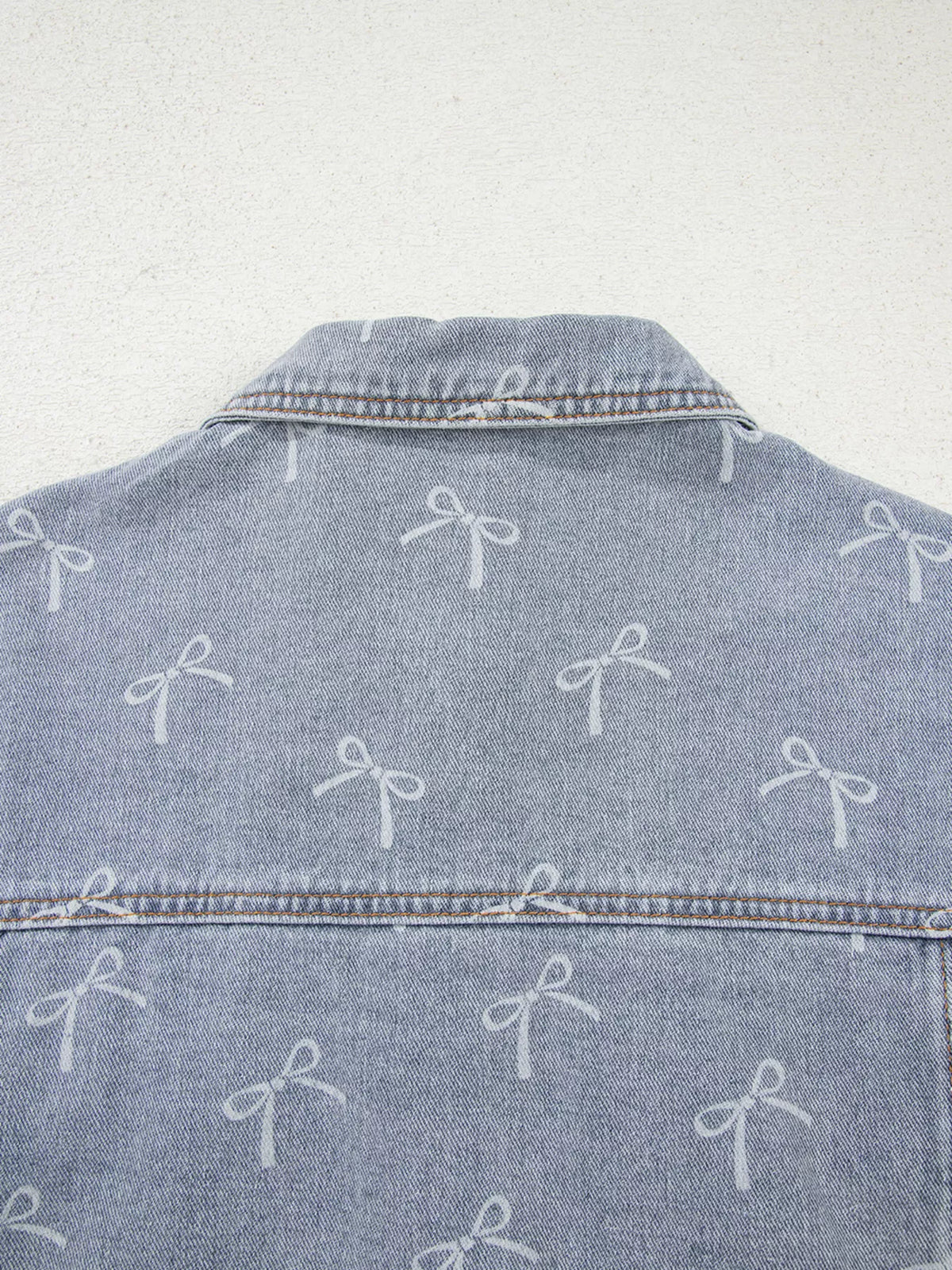 Bow Print Raw Hem Denim Jacket in Light Wash view 8