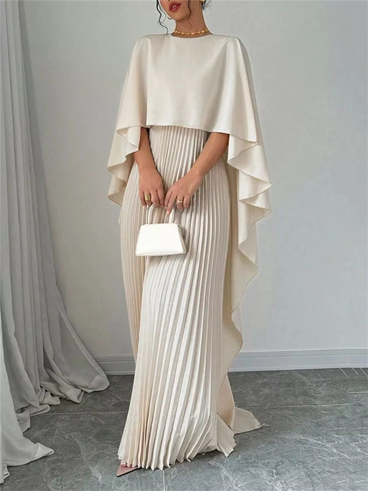 cape sleeve pleated maxi dress skirt and hem detail