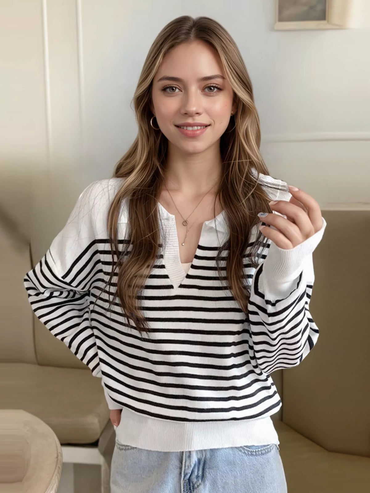 Striped long sleeve knit top, side view