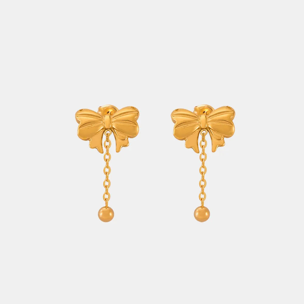Close up of titanium steel bow earrings