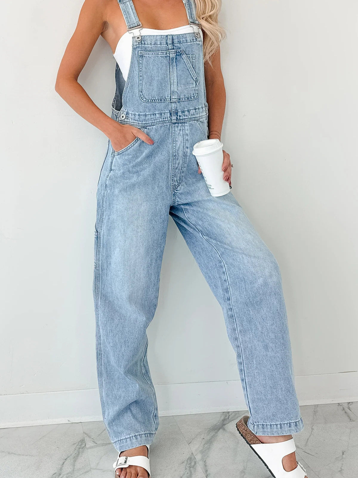 Denim overalls relaxed body side view