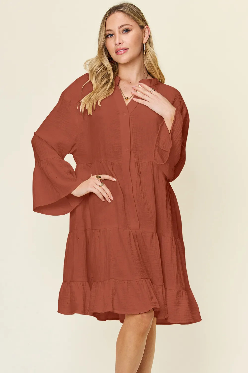 Textured button up ruffle hem dress front view