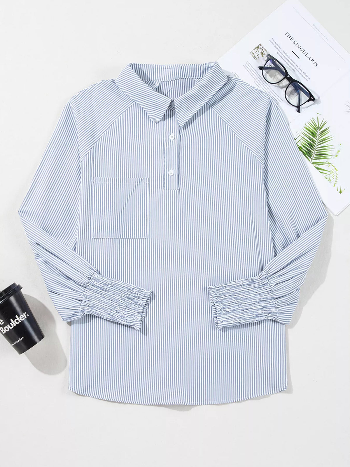 Blouse collar styled open at the neck