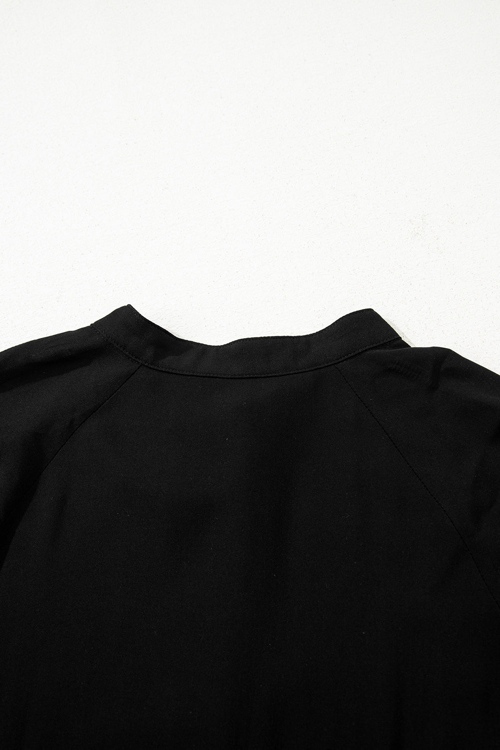 Black flared maxi dress detail of ruffle tiers