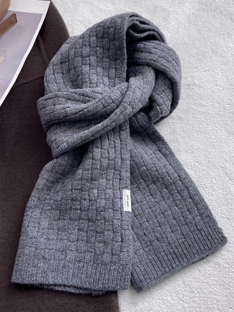 Wool woven pattern knitted scarf shown at full length