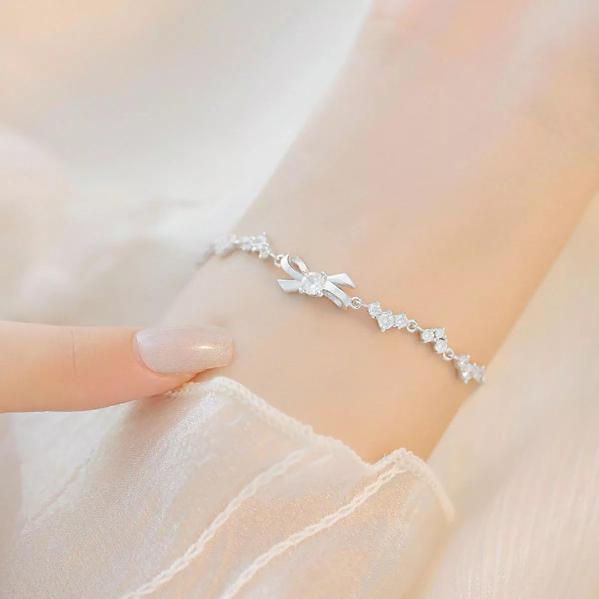 Bow bracelet presented in its matching gift box