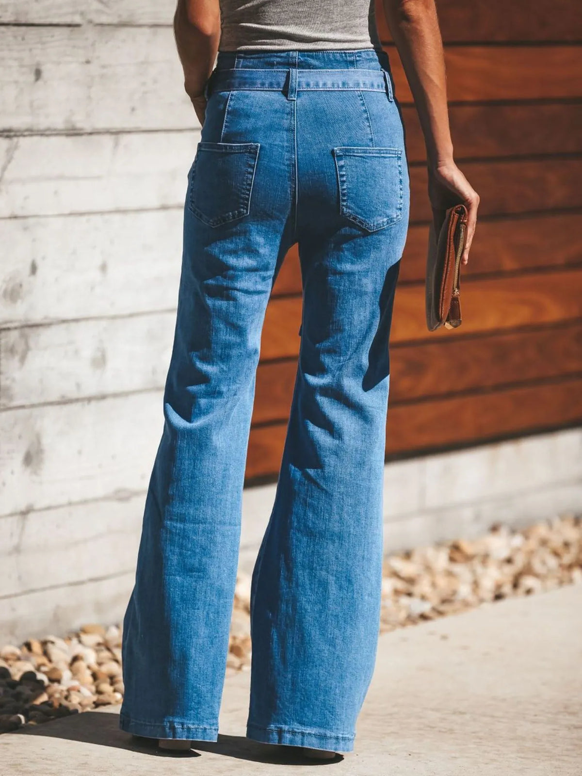 Bow tie waist detail on flare jeans