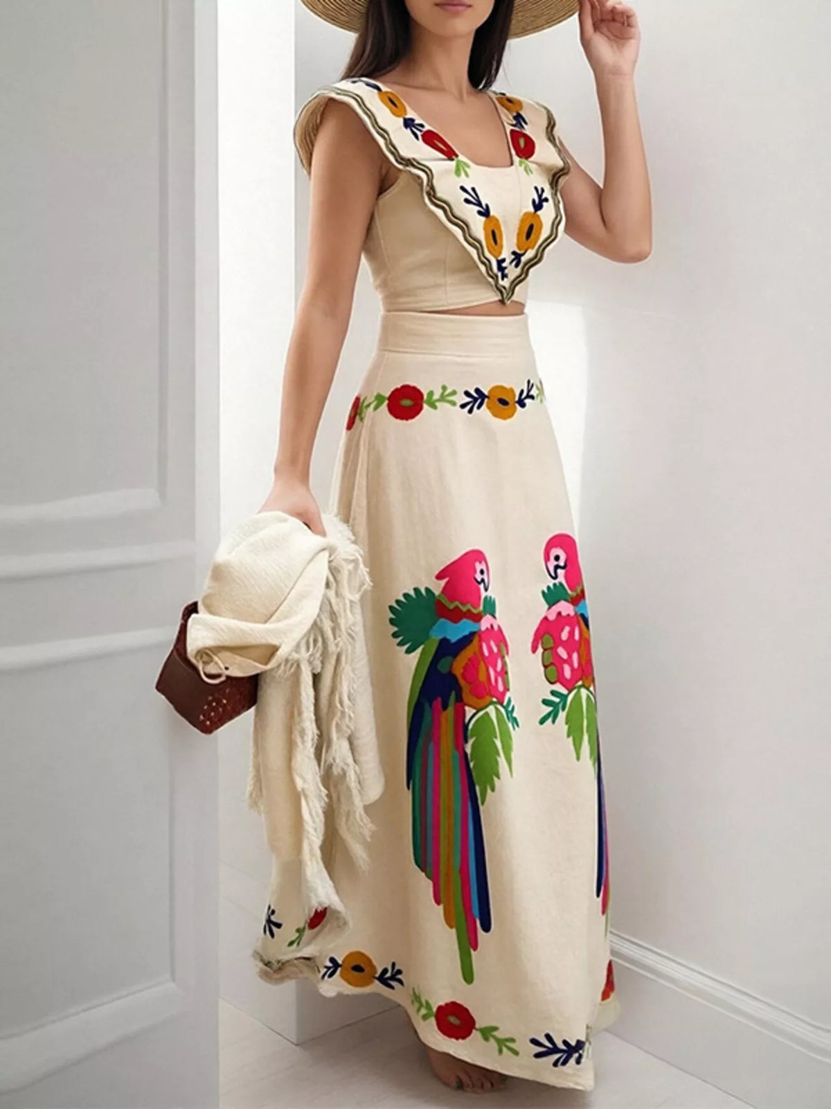 Parrot print maxi skirt flowing hem detail