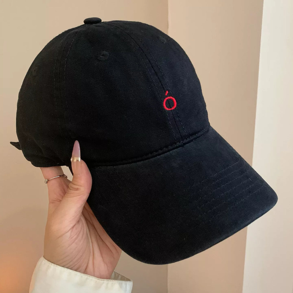 Embroidered cotton baseball cap in brown, front view