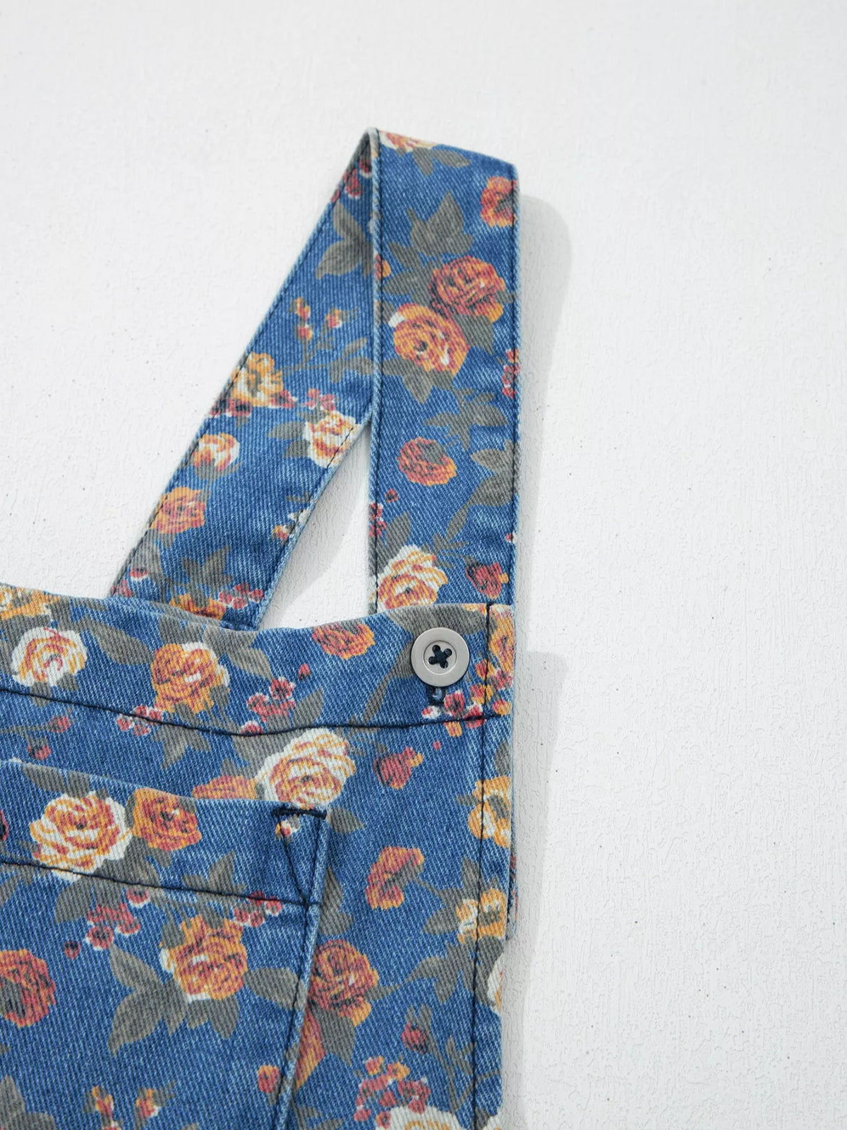 Floral denim overalls worn with tee