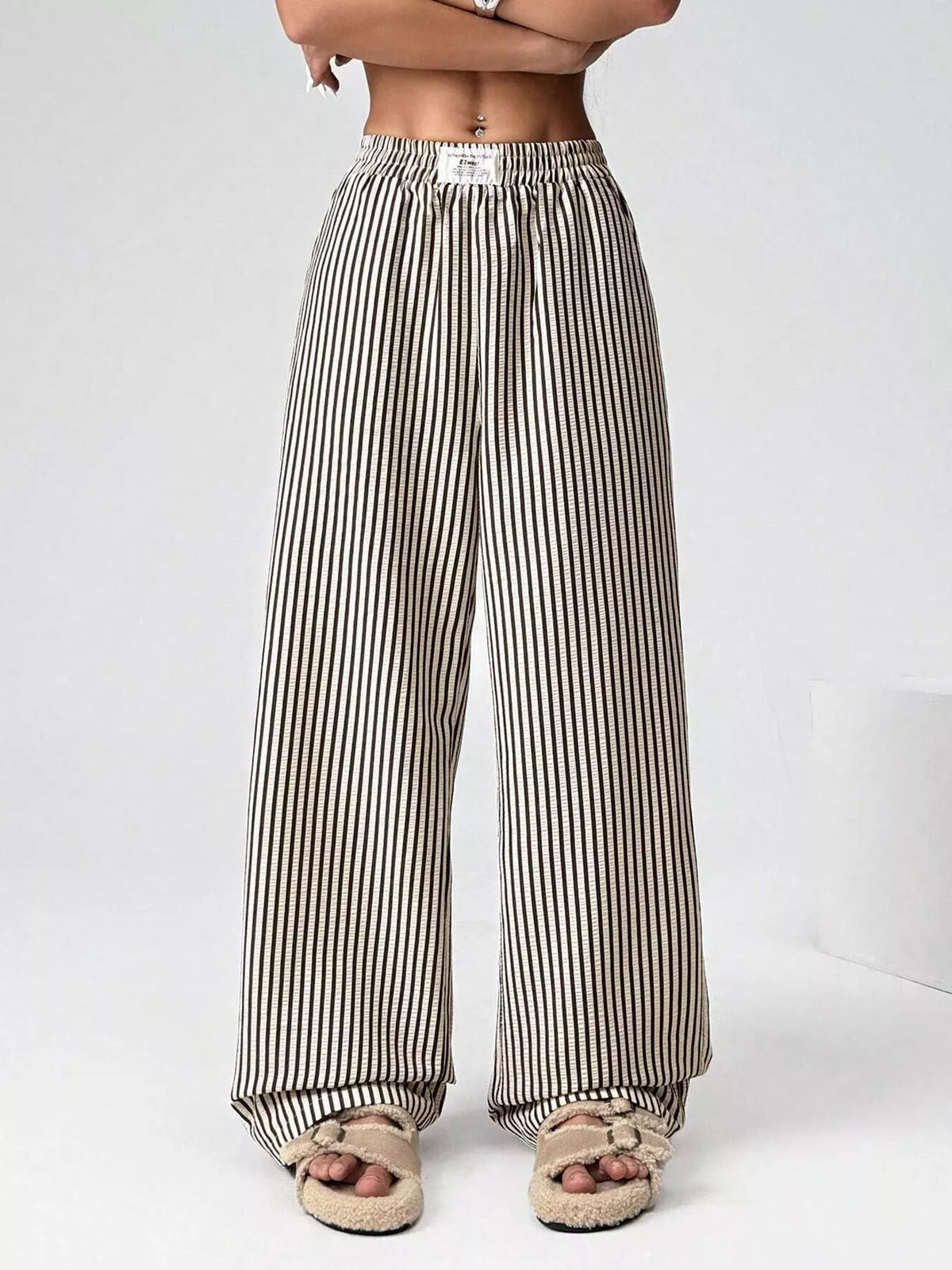 Striped high waist wide leg pants, close up of the detail