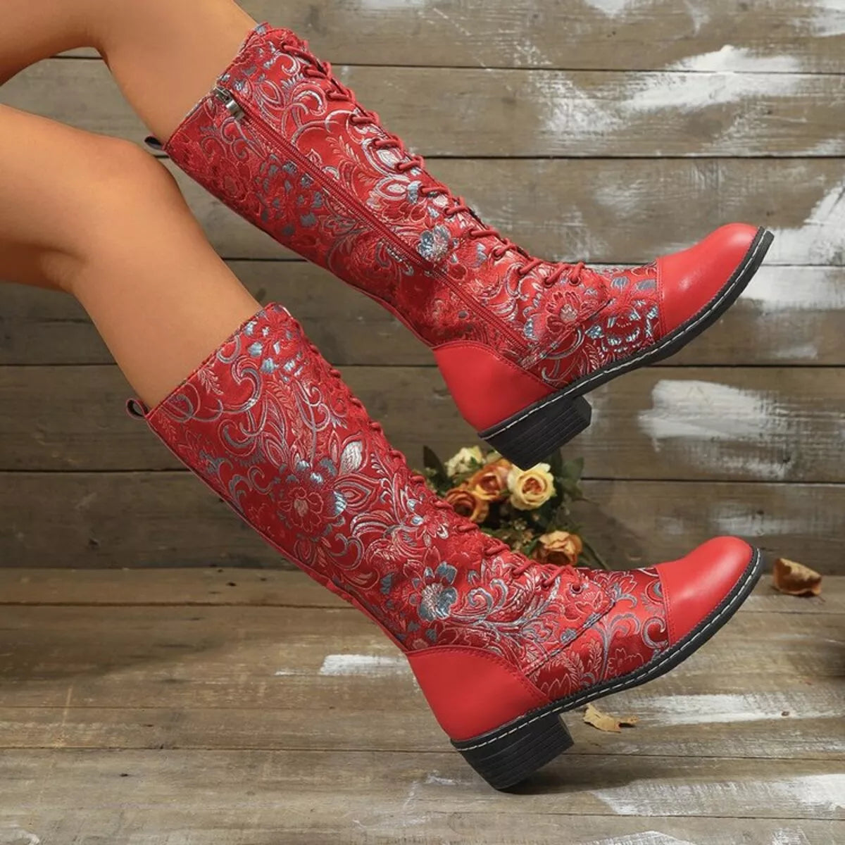 Lace up block heel boots heel and sole detail
