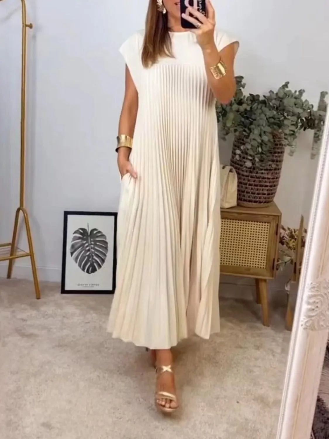 cream pleated round neck maxi dress with pockets back view