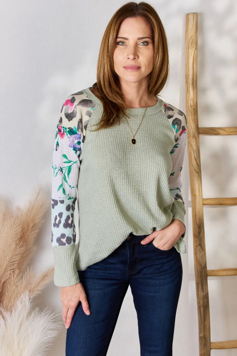 Printed round neck blouse front view in sage