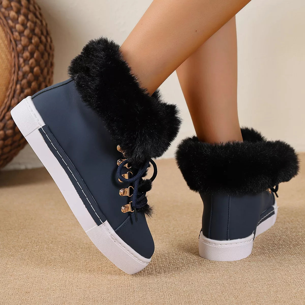 Fur lined round toe platform boots worn with denim