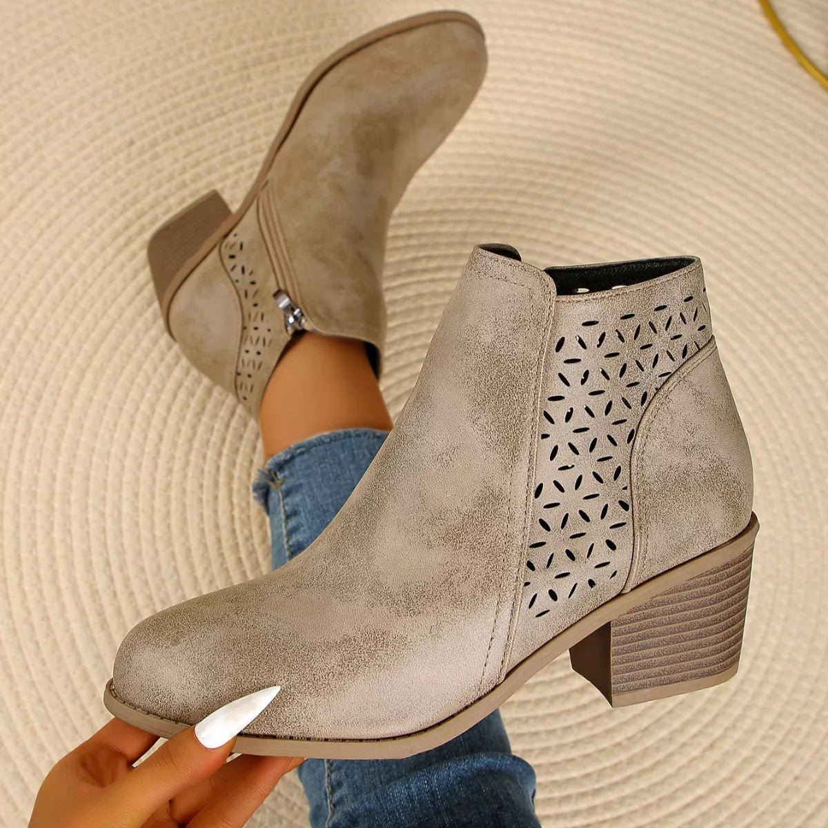 Point toe block heel boots profile of the ankle