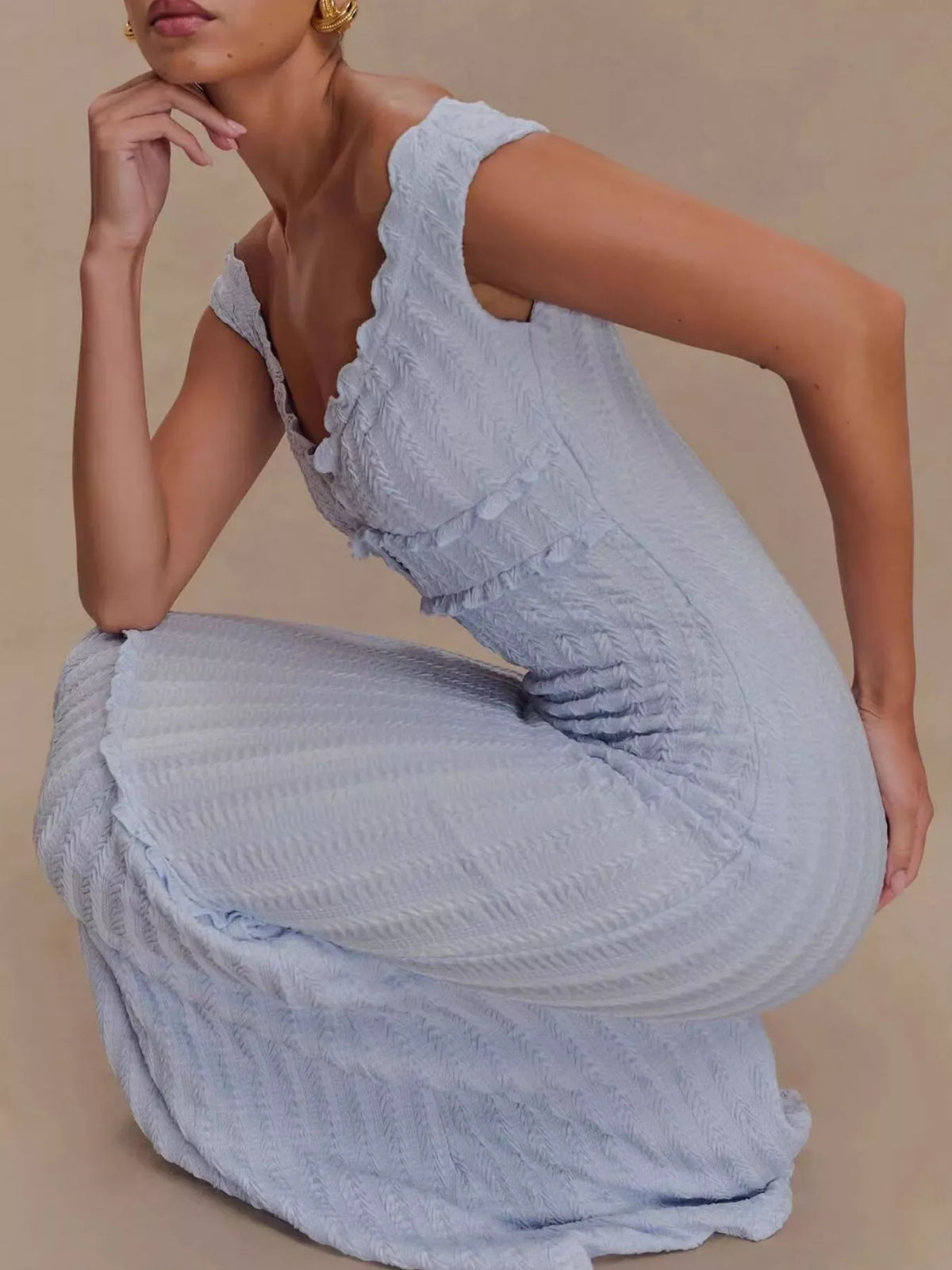 Side profile showing the mermaid silhouette and hem