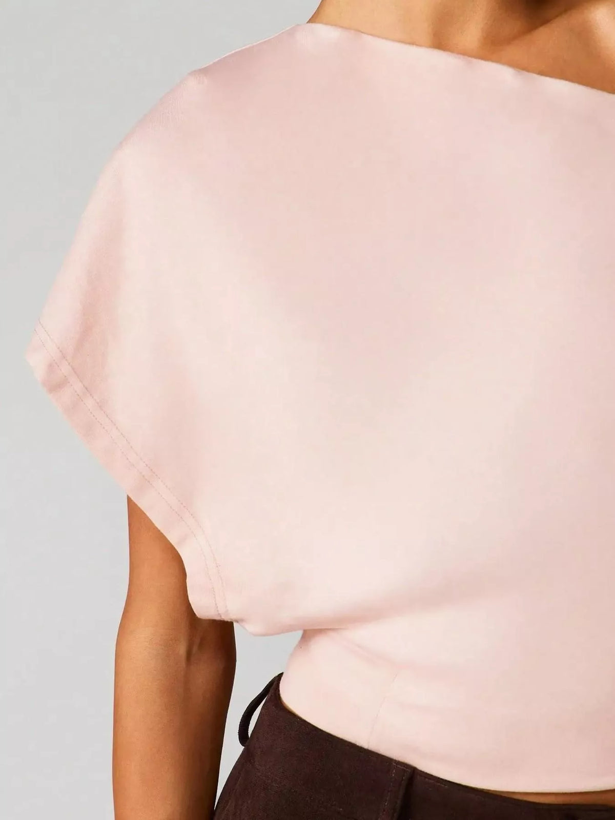 One shoulder crop tee on model