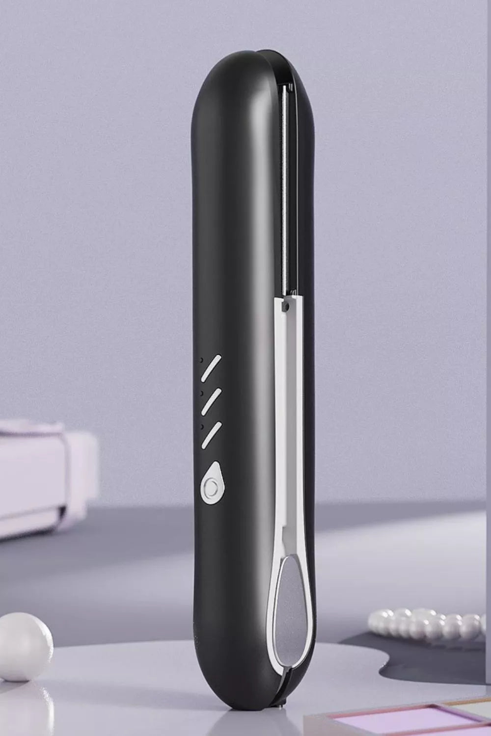 Portable flat iron with control buttons