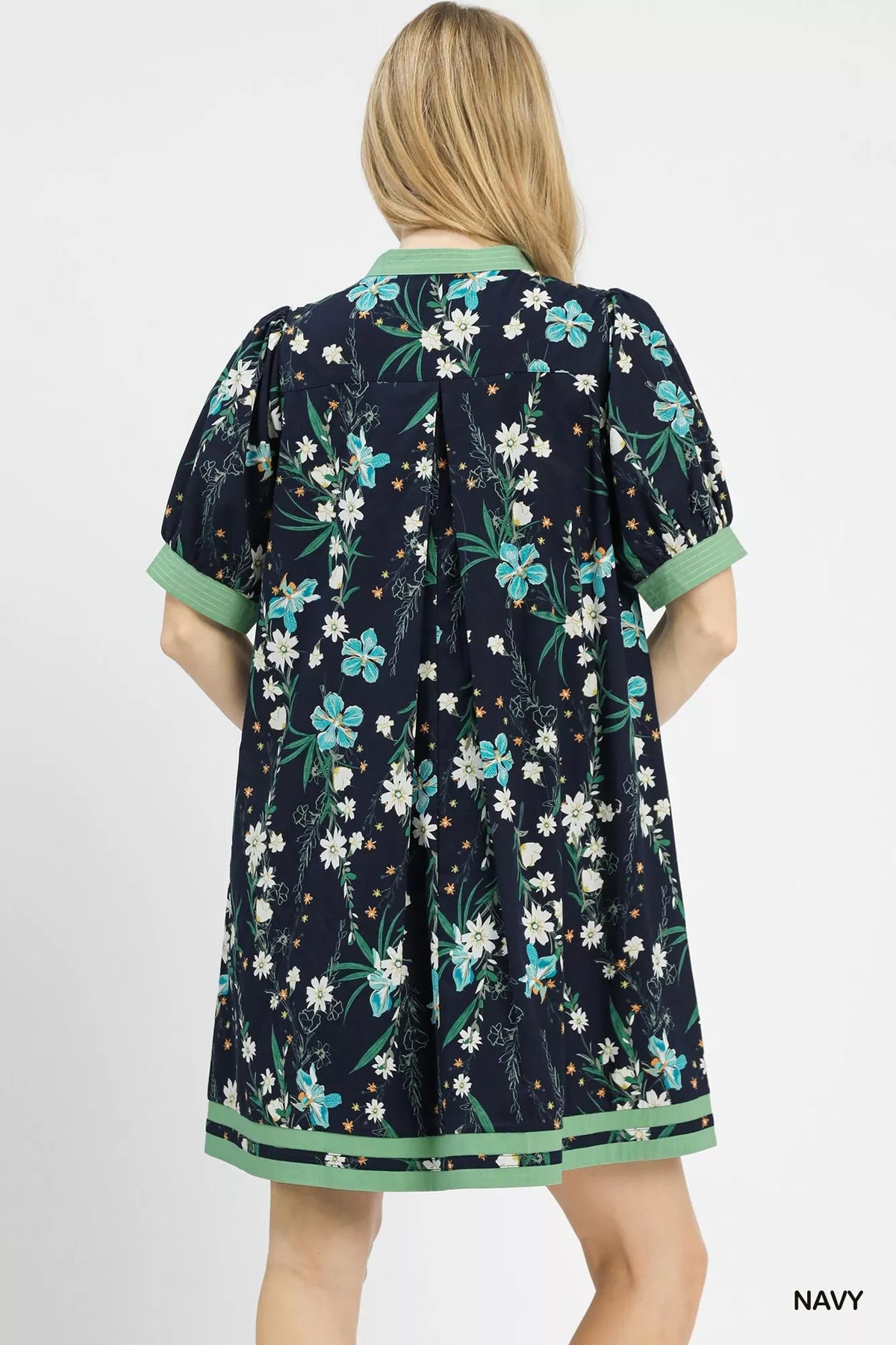 Navy floral puff sleeve contrast trim dress side view