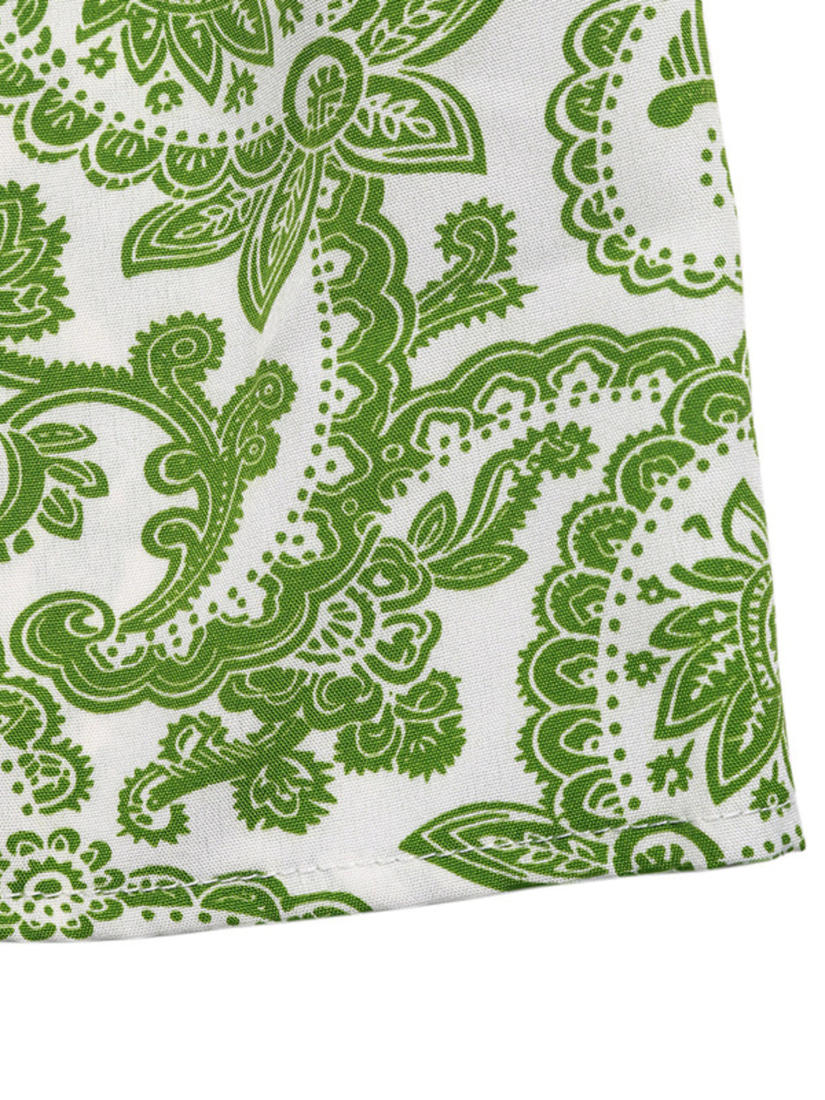 Hem detail on the long green printed skirt
