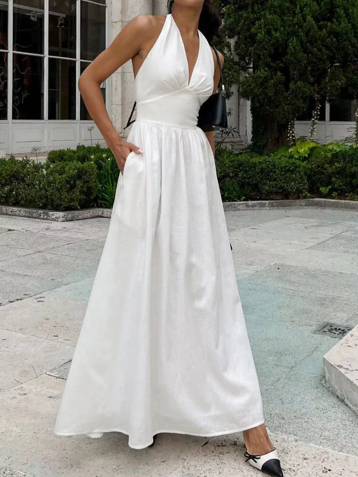 white halter neck tied flowy maxi dress back view