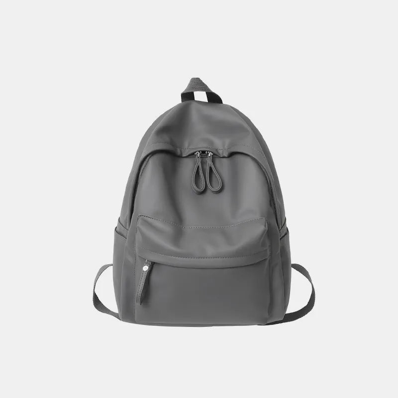 Faux leather zip backpack front pocket detail