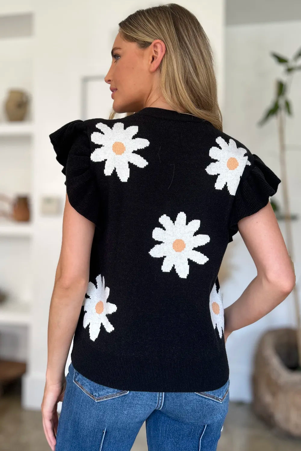 Cap sleeve ruffled sweater side view