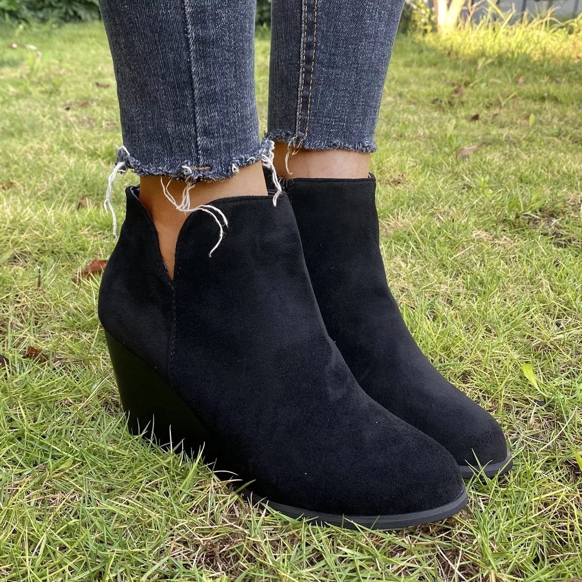 Round toe wedge ankle boots back view