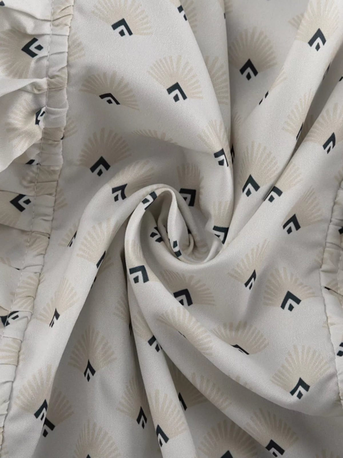 Ruffle detail at the sleeve