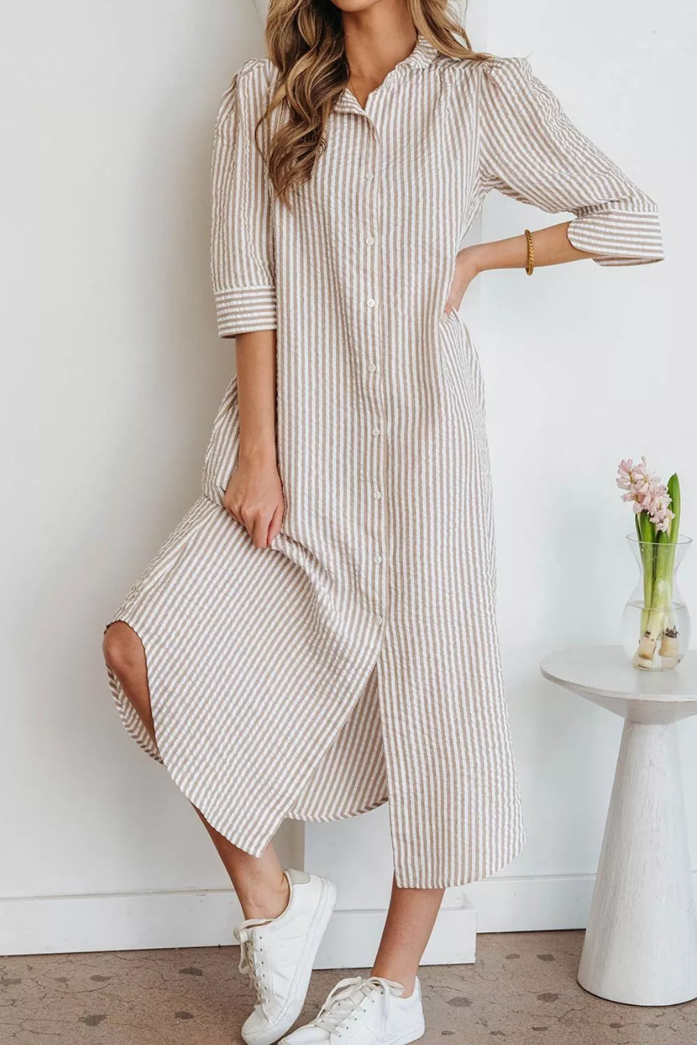 Striped shirt dress side profile view