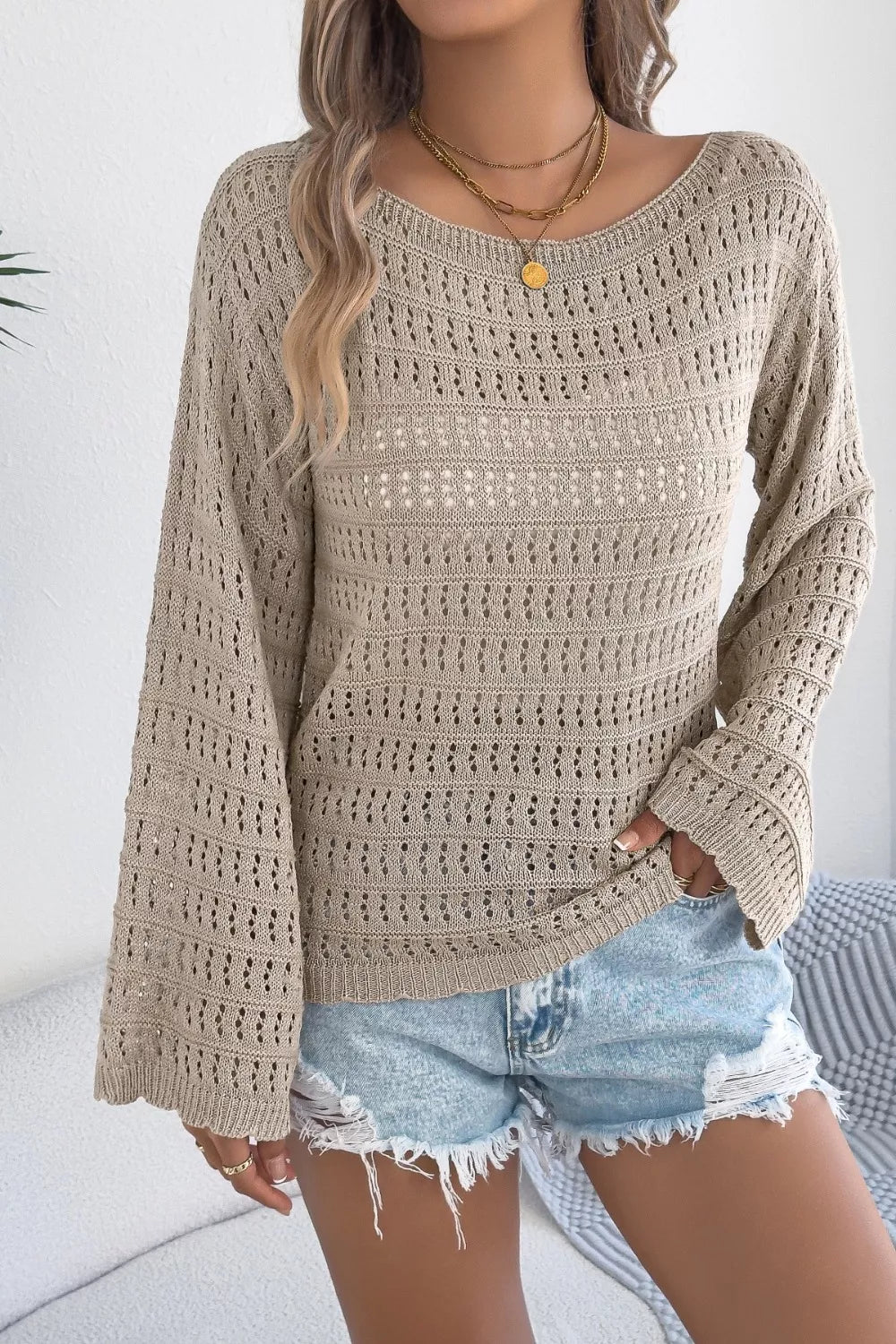 Eyelet openwork knit texture detail
