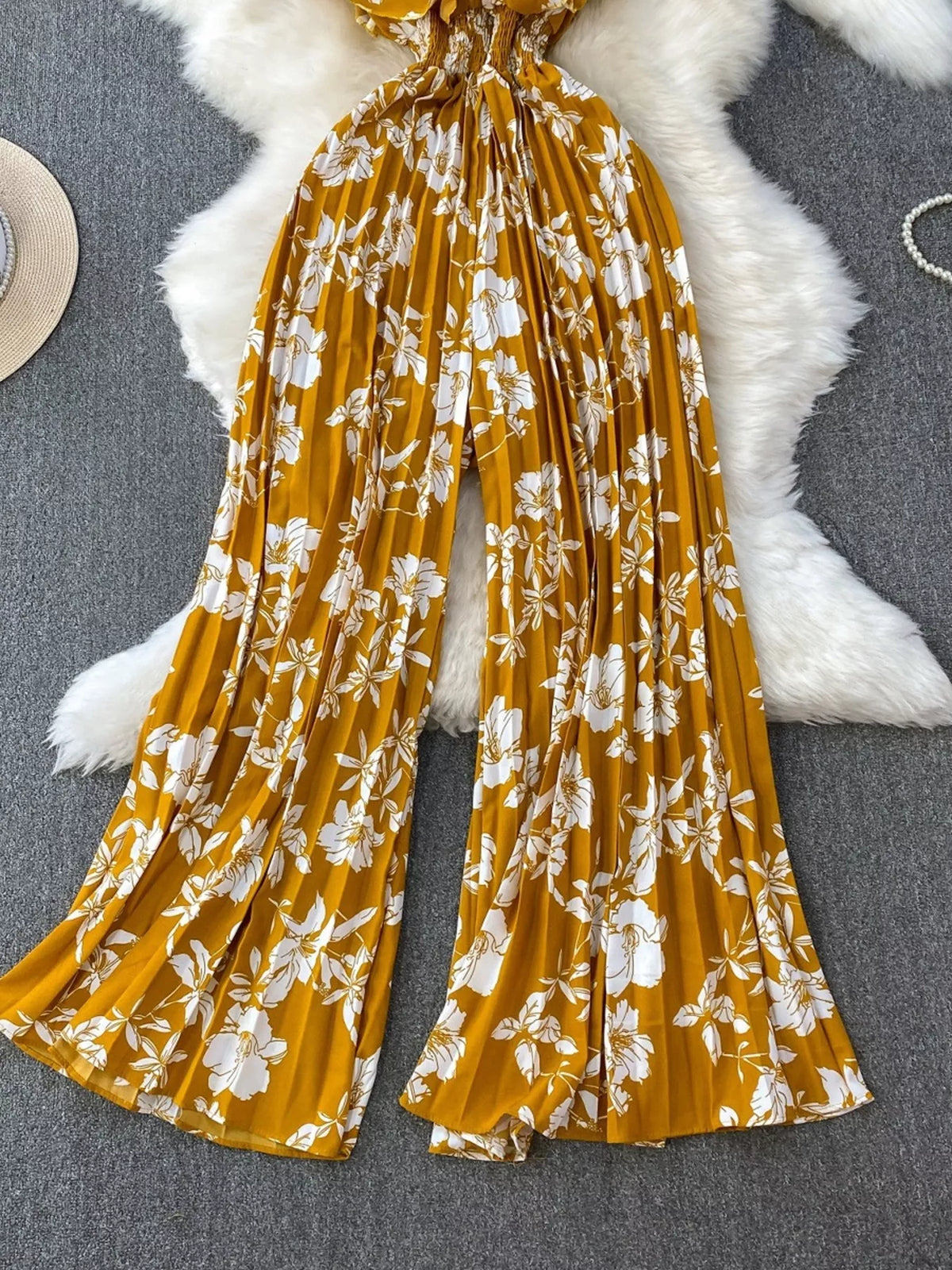 Floral print wide leg pleated jumpsuit front view