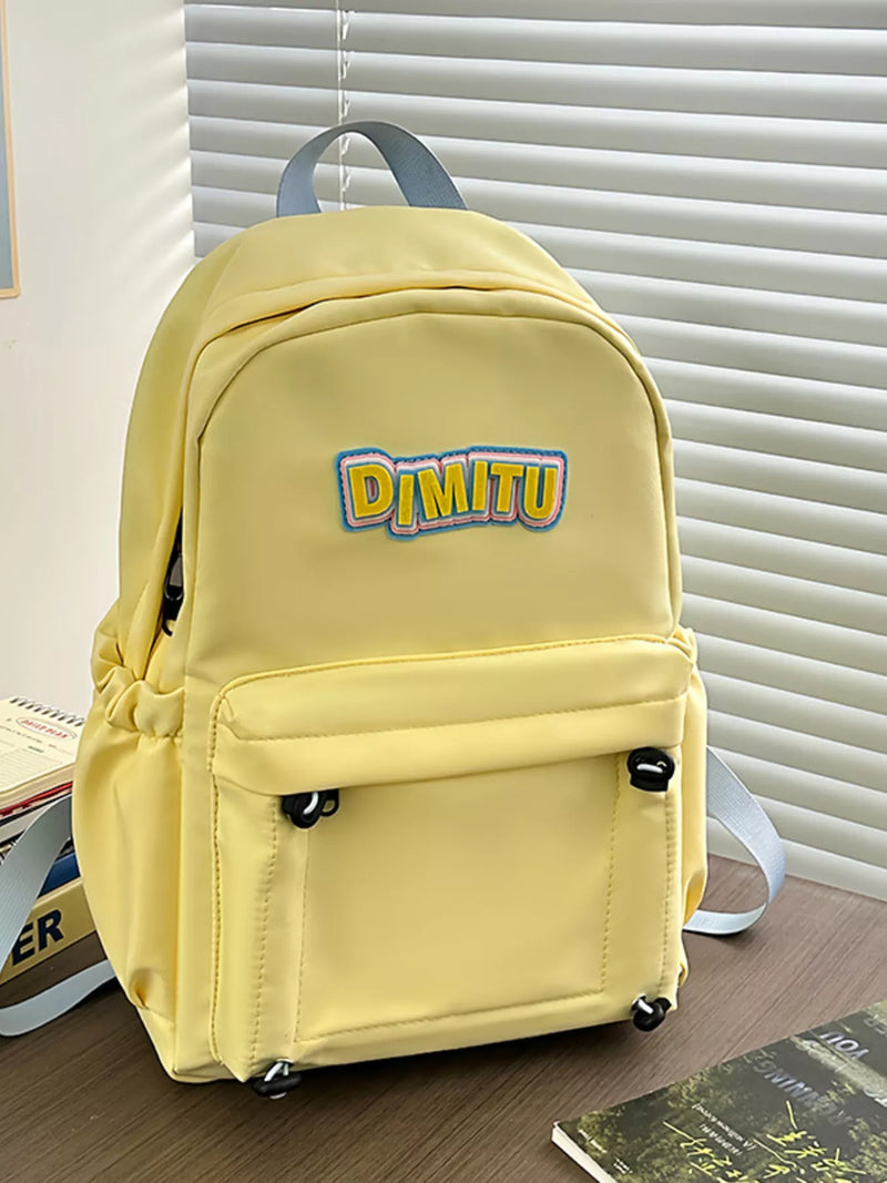 pastel yellow nylon backpack front view