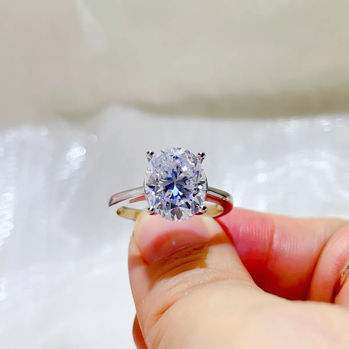 Moissanite ring on hand showing stone scale