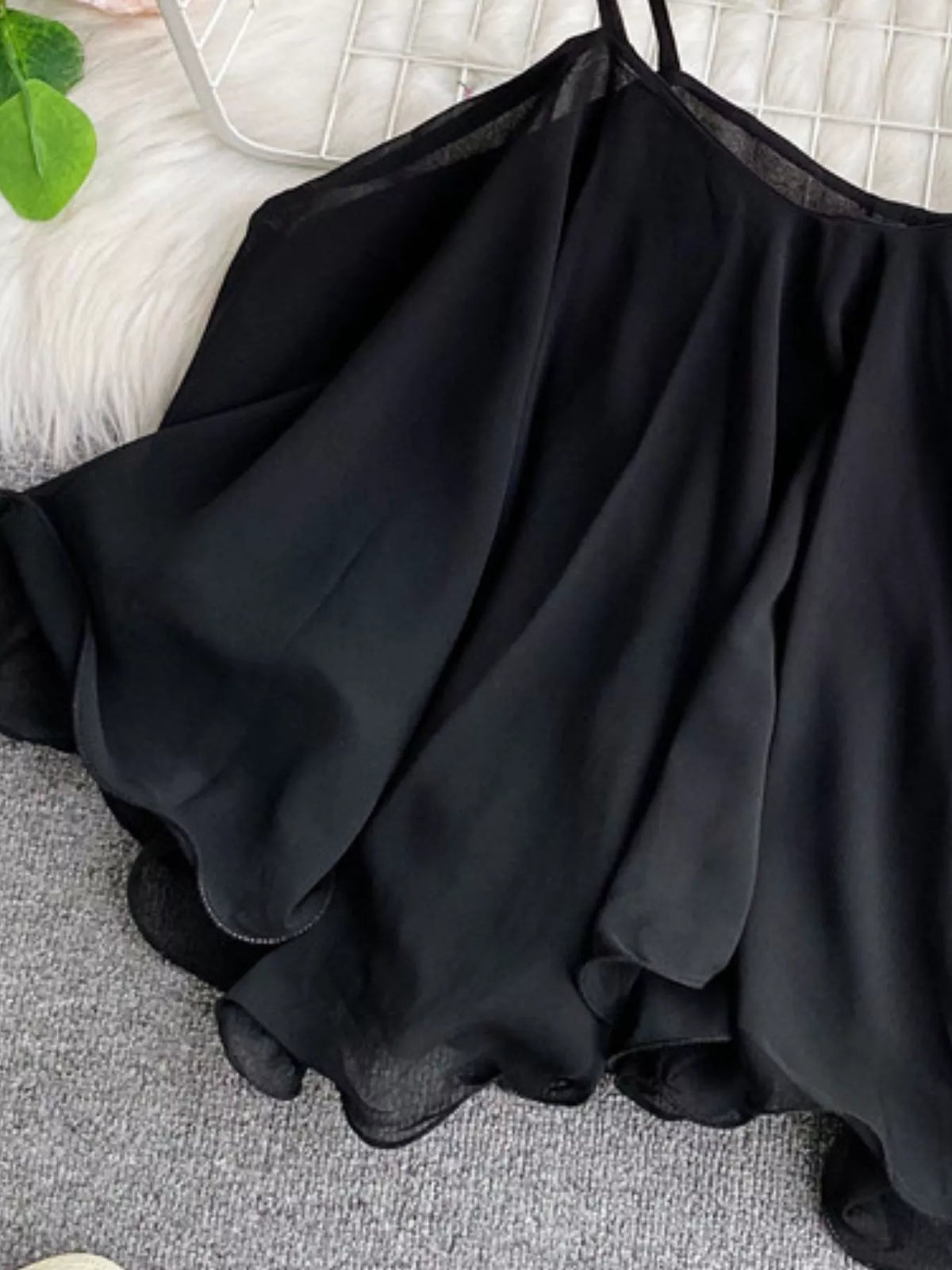 Ruffled flowy cami top close up detail