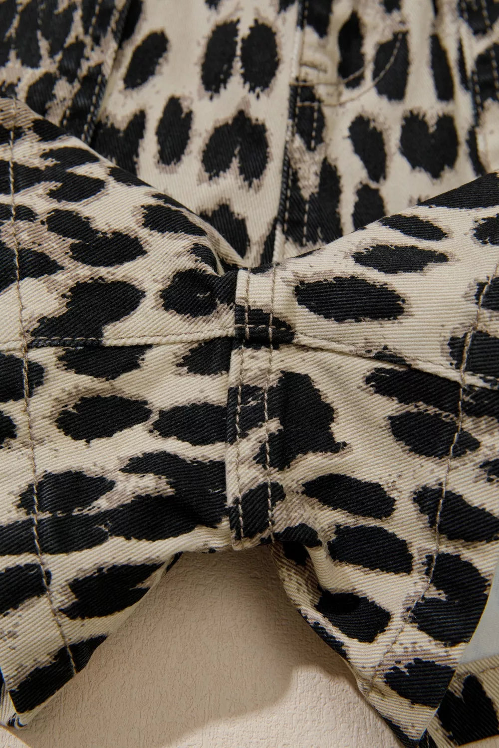 Leopard print lace up mid rise denim shorts front view