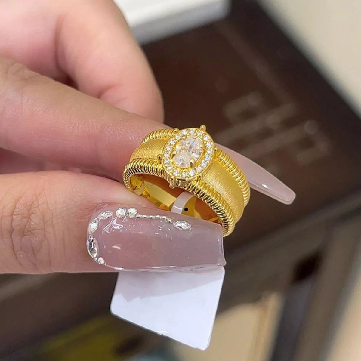 Gold plated ring band profile view