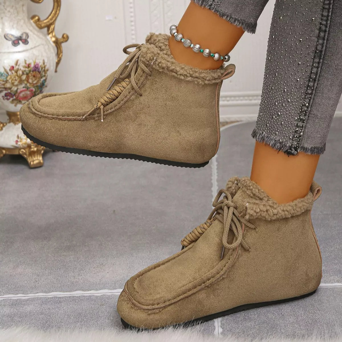 Plush lined ankle boots worn with denim