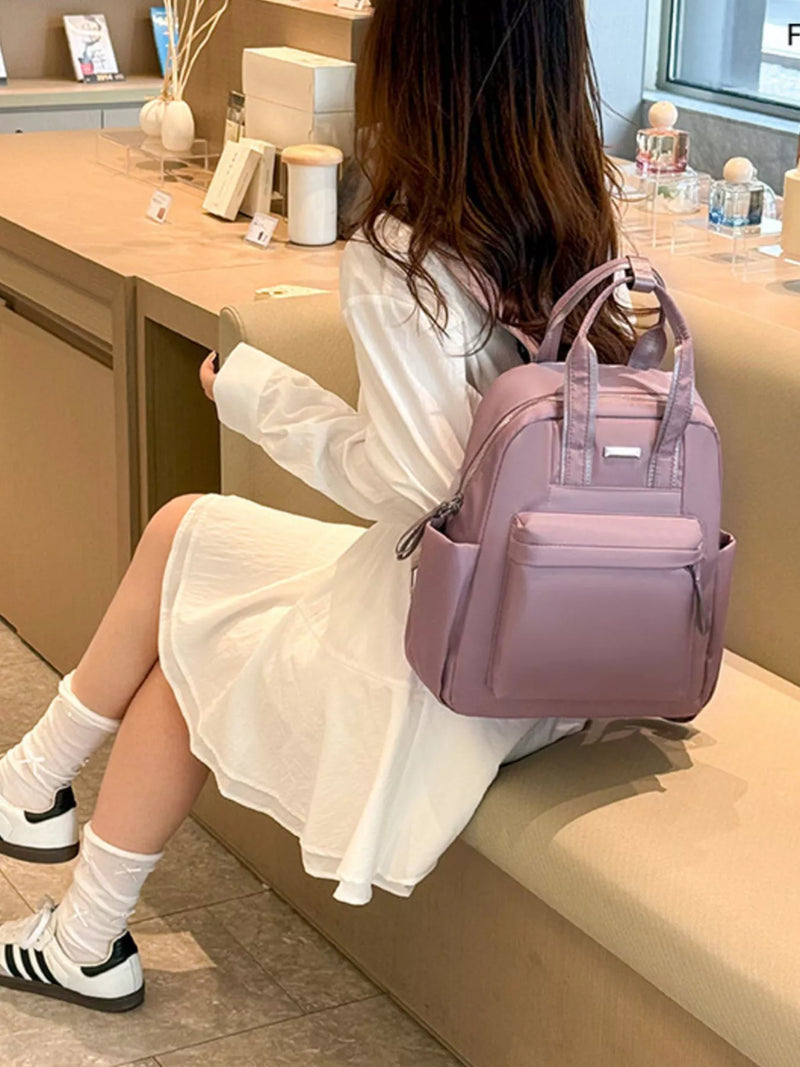 Purple PU leather backpack front view