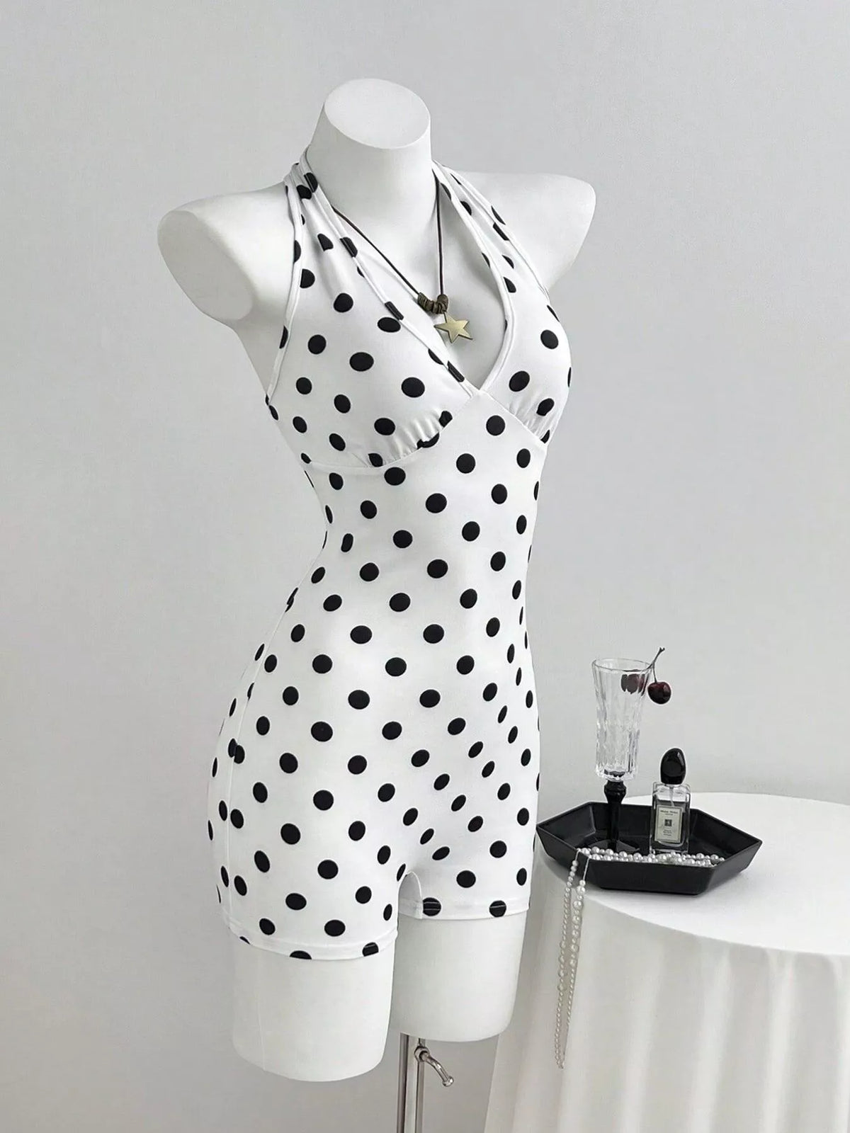 Back view of the halter romper with tie fastening