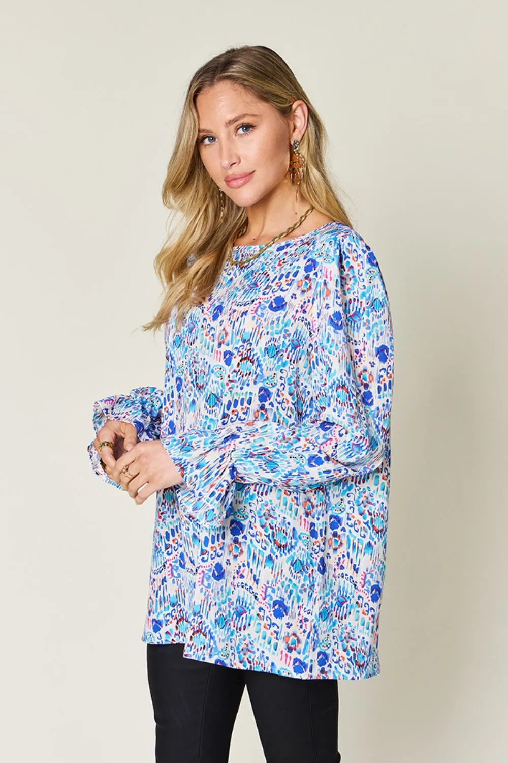 Flounce sleeve detail on printed womens blouse