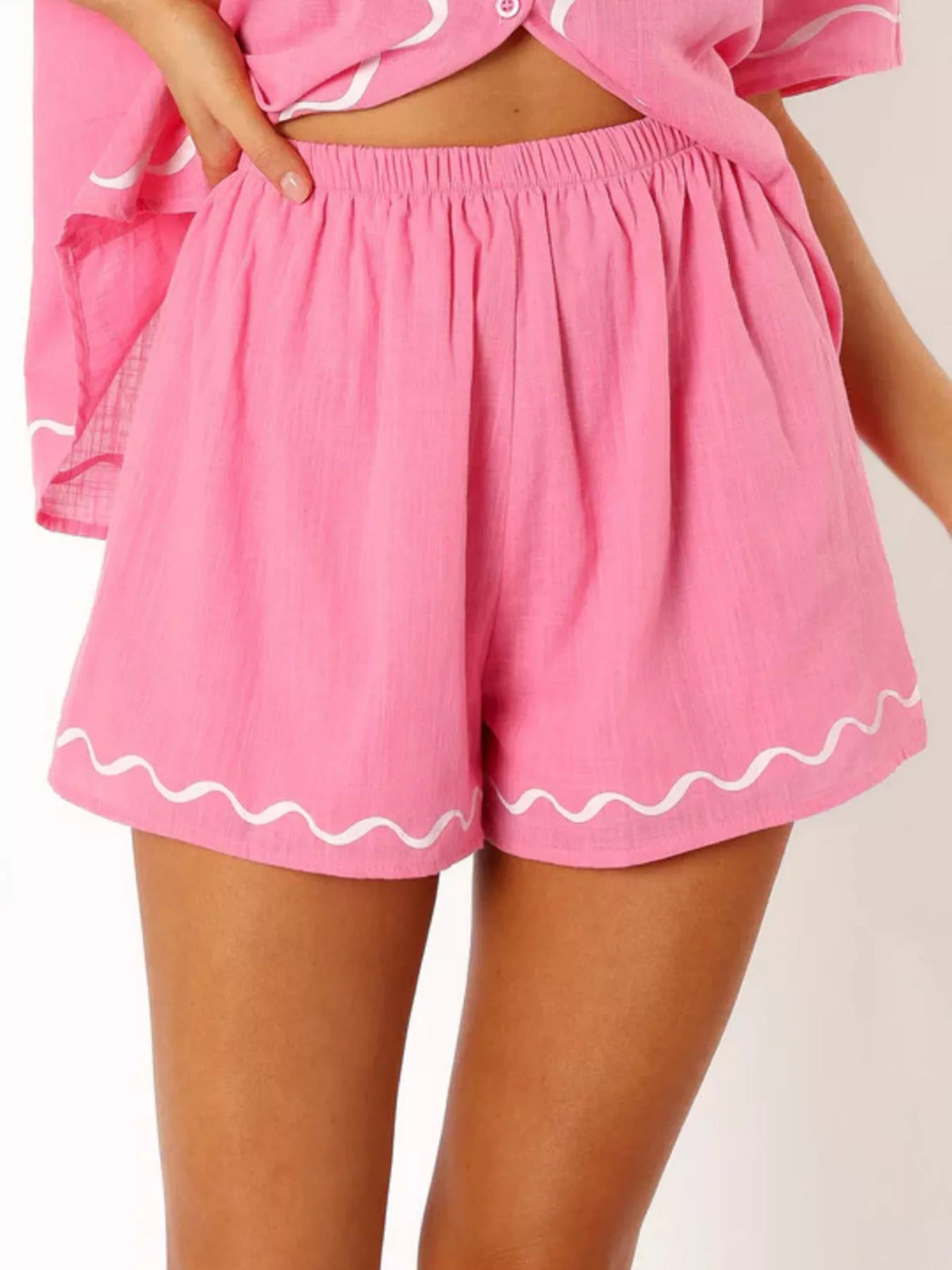 Pink shirt and shorts styled summer look