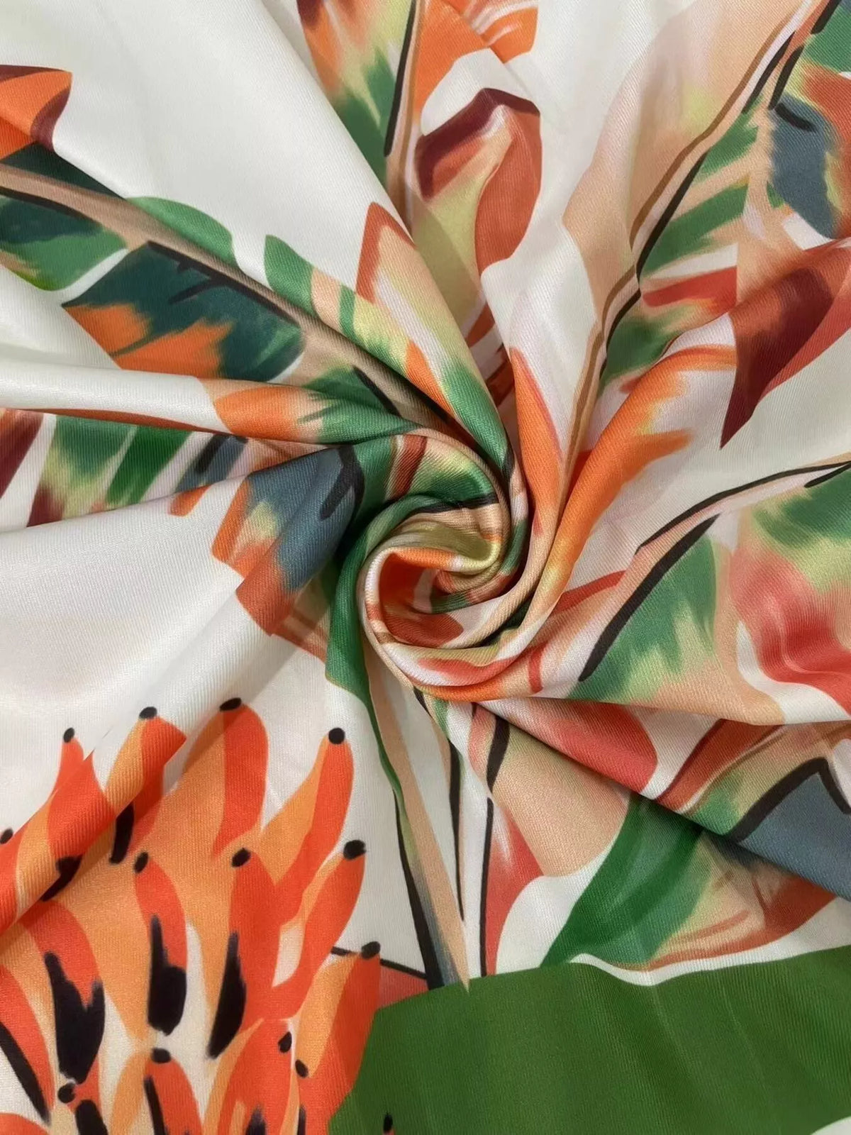 White tropical print maxi dress styled with sandals