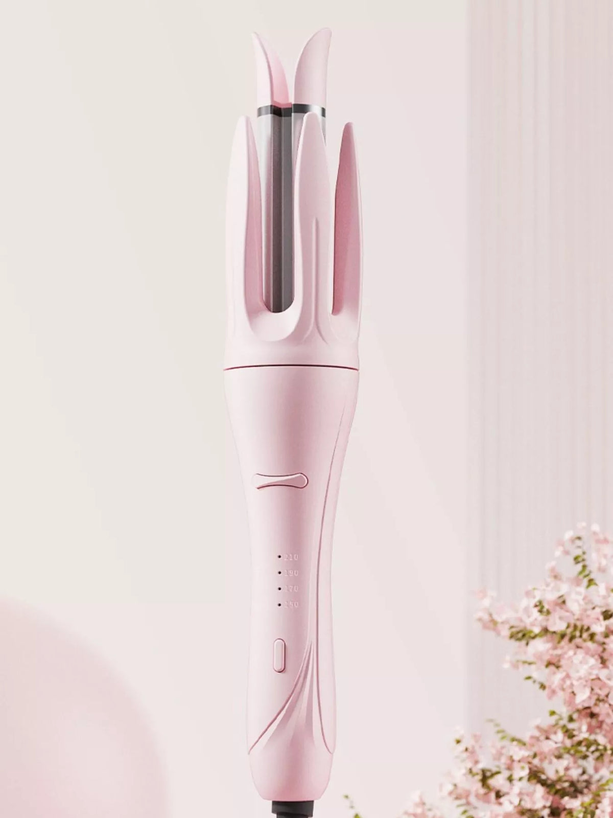 Rotating curling iron barrel close up