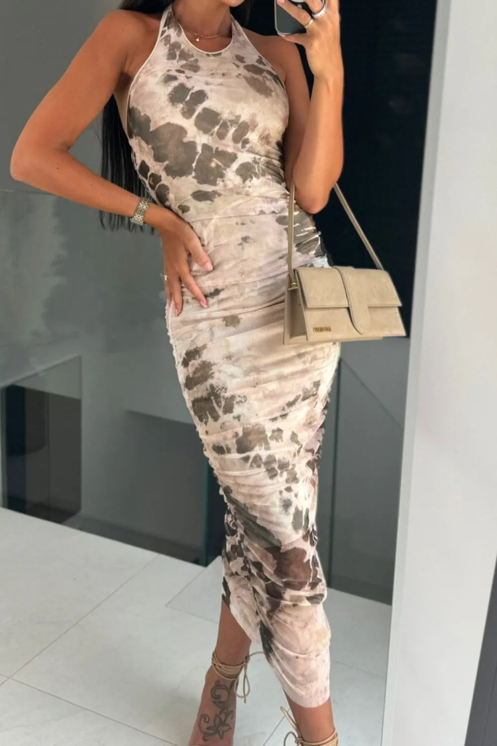Printed halter dress in tan colorway