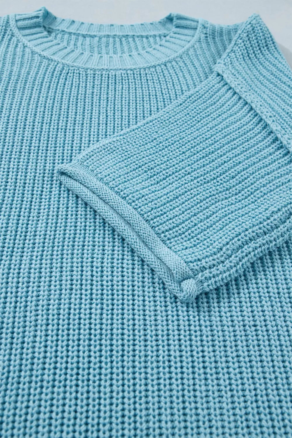 Soft cotton blend sweater in pastel blue on model