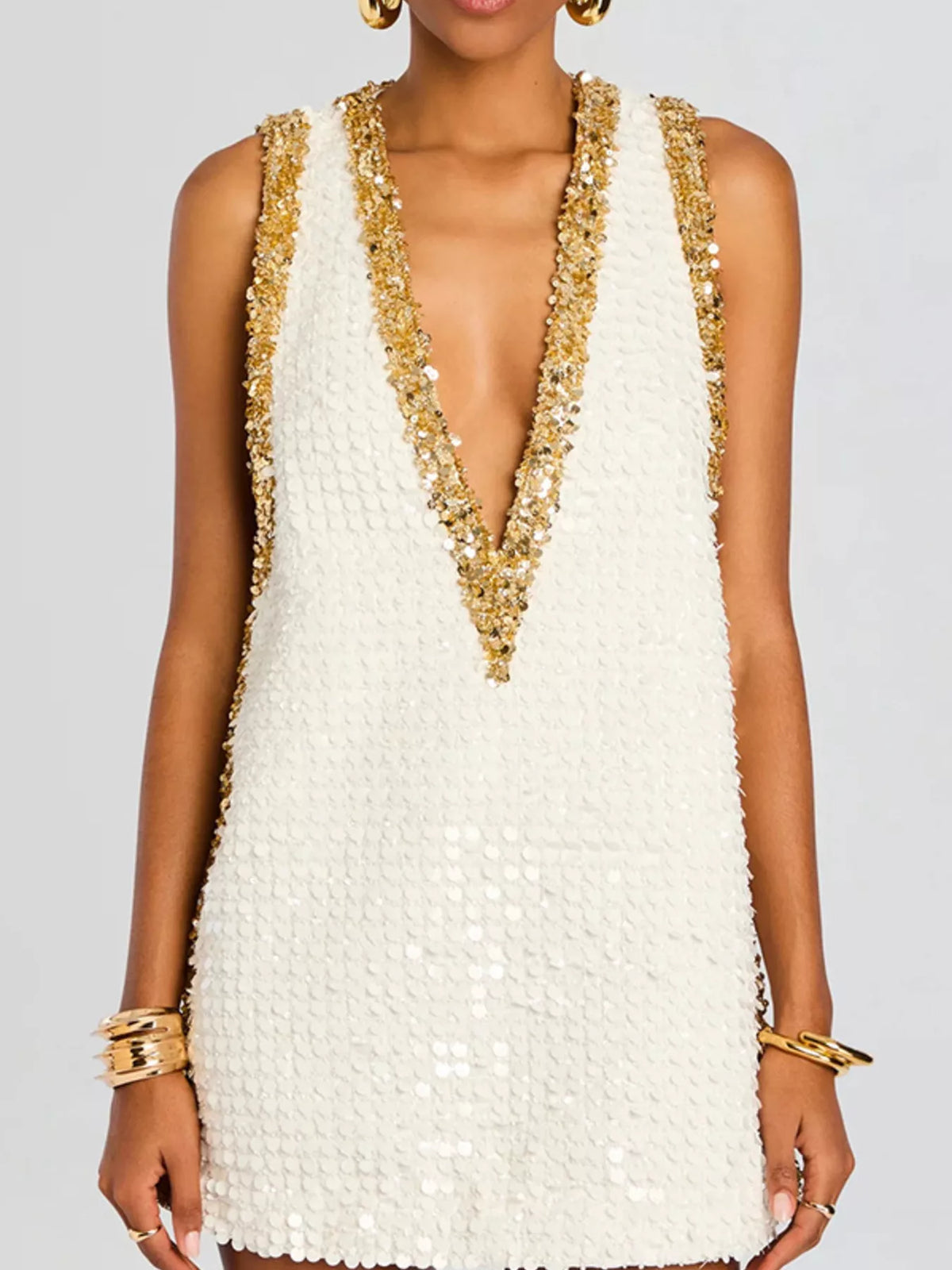 Sleeveless sequin mini party dress, side profile