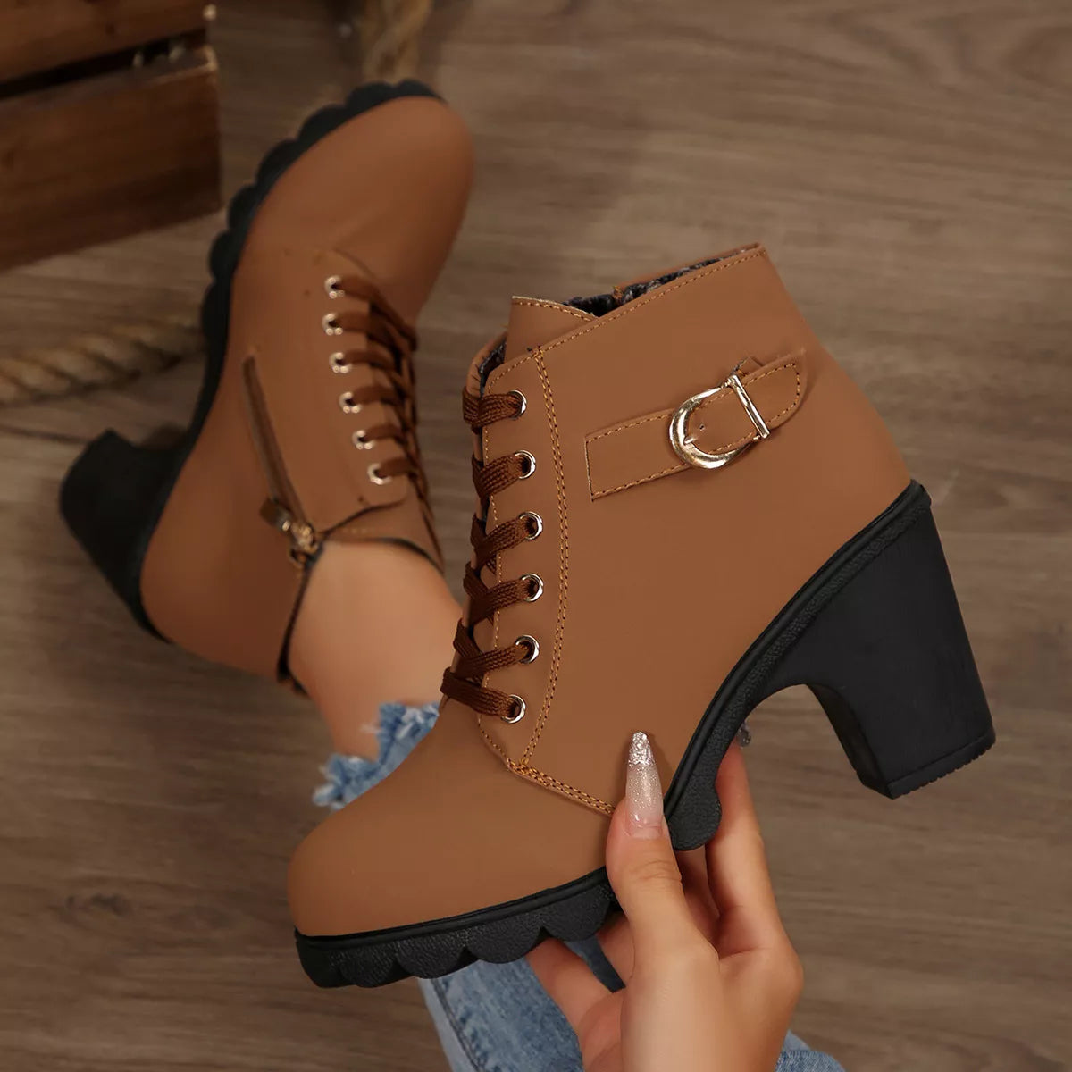 Lace up block heel suede boots paired with denim
