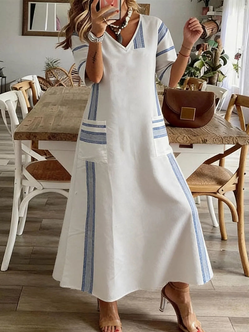 Striped V neck maxi dress in white, front view on model